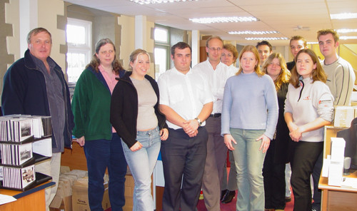 Nigel and Sue Bayley (on the far left), together with their staff in 2002